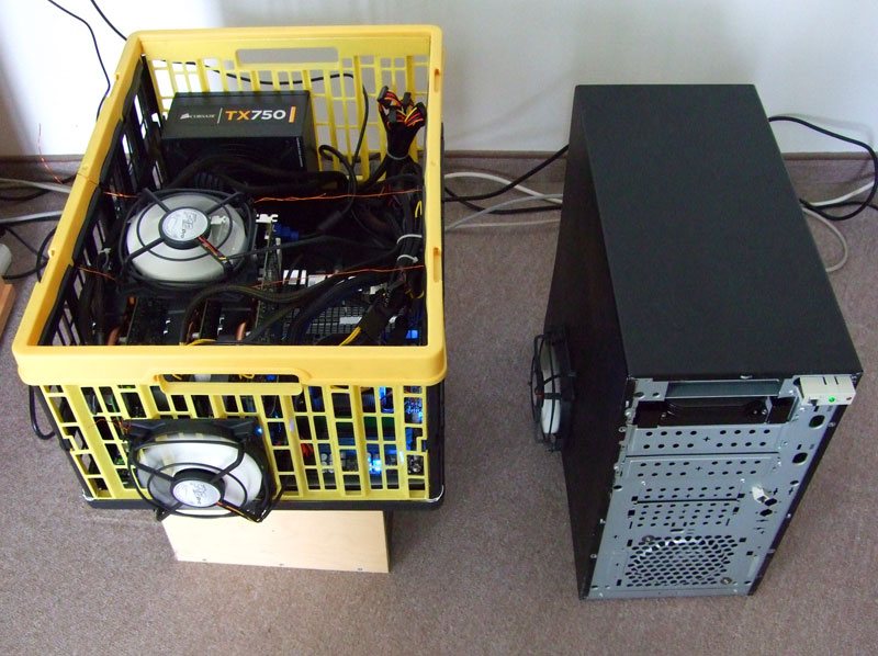 Bitcoin mining rig in plastic crate
