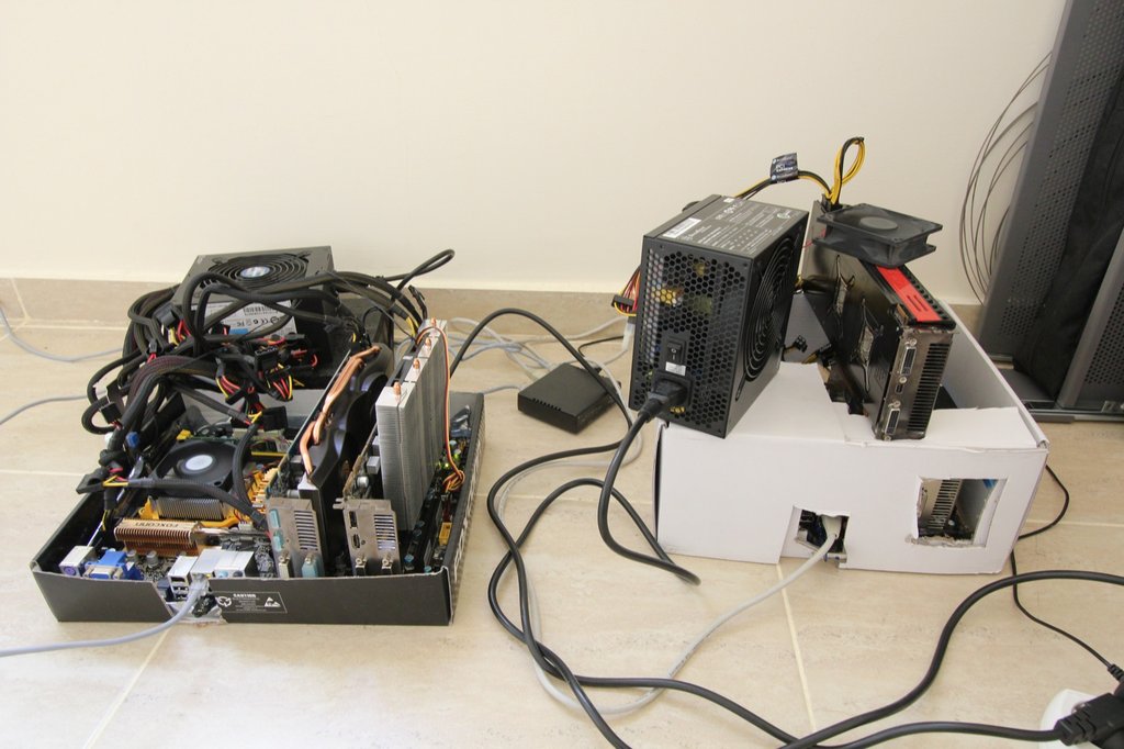 Bitcoin mining rig in cardboard