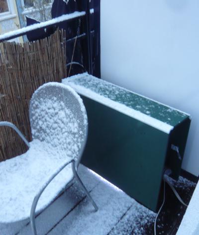 Bitcoin miner outdoor covered in snow